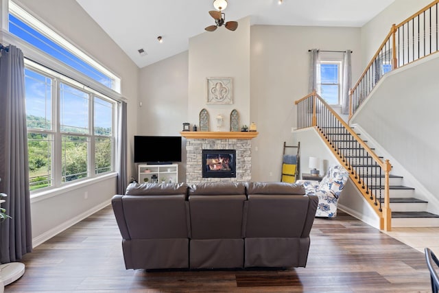 115 Westwoods Dr, Georgetown, KY 40324 - living area featuring stairs, high vaulted ceiling, wood finished floors, and a fireplace
