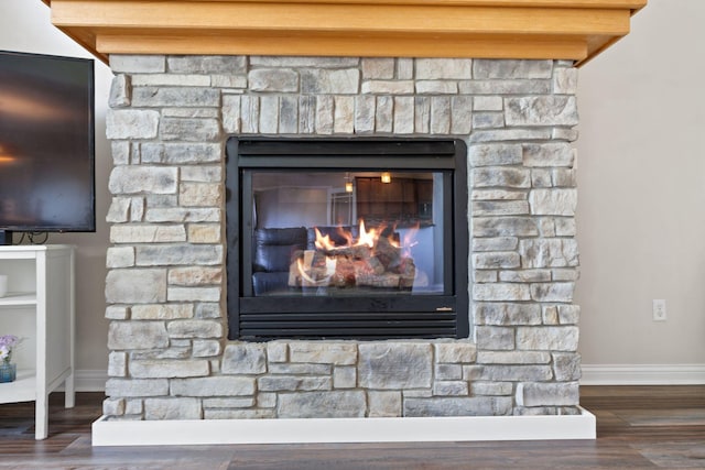 115 Westwoods Dr, Georgetown, KY 40324 - detailed view of wood finished floors and a glass covered fireplace