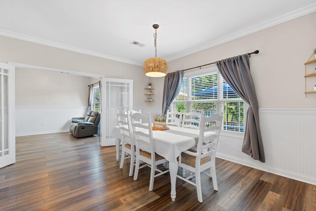115 Westwoods Dr, Georgetown, KY 40324 - dining area featuring wainscoting, wood finished floors, and crown molding