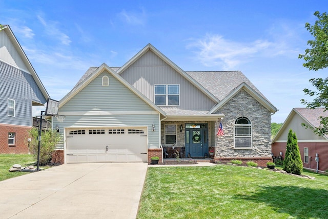 115 Westwoods Dr, Georgetown, KY 40324 - craftsman house featuring concrete driveway, a front yard, an attached garage, board and batten siding, and brick siding
