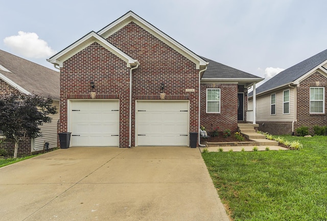 3224 Orchard Grass Rd, Lexington, KY 40509 - view of front of home with brick siding, driveway, a garage, and a front yard