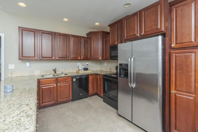 3224 Orchard Grass Rd, Lexington, KY 40509 - kitchen with black appliances, light stone countertops, recessed lighting, and light tile patterned floors