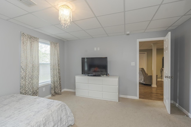 3224 Orchard Grass Rd, Lexington, KY 40509 - bedroom with a drop ceiling, light colored carpet, and a chandelier
