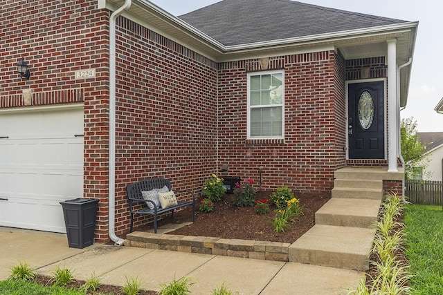 3224 Orchard Grass Rd, Lexington, KY 40509 - entrance to property featuring brick siding, an attached garage, and a shingled roof