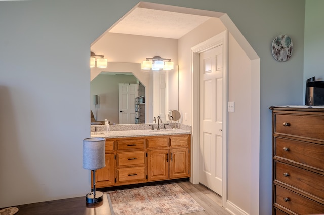 196 Herndon Ln, Berea, KY 40403 - bathroom with wood finished floors and double vanity