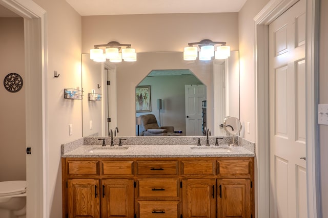 196 Herndon Ln, Berea, KY 40403 - ensuite bathroom featuring double vanity and toilet