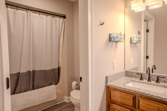 196 Herndon Ln, Berea, KY 40403 - bathroom featuring vanity, wood finished floors, and shower / bath combo