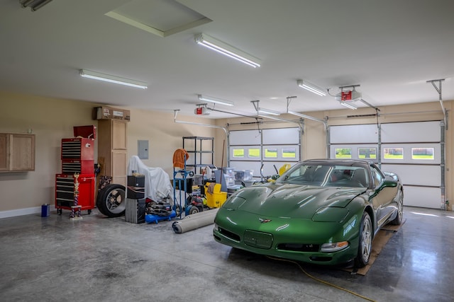 196 Herndon Ln, Berea, KY 40403 - garage with electric panel and a garage door opener