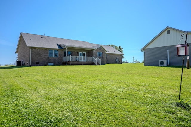 196 Herndon Ln, Berea, KY 40403 - rear view of house with a lawn, brick siding, a wooden deck, and crawl space