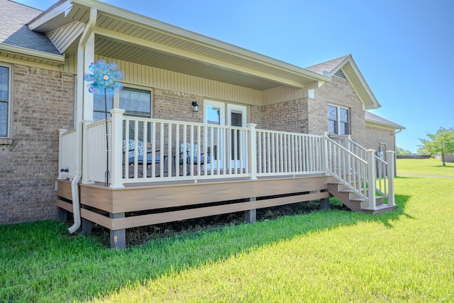 196 Herndon Ln, Berea, KY 40403 - view of side of property with brick siding, a deck, roof with shingles, and a yard