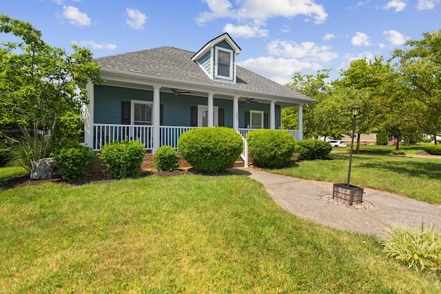 101 Rock Bridge Ct, Georgetown, KY 40324 - view of front facade with a front lawn, a shingled roof, ceiling fan, and covered porch