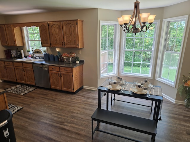 10 Thaxted Ln, Middlesboro, KY 40965 - kitchen featuring dishwasher, dark countertops, brown cabinetry, a chandelier, and dark wood-style flooring