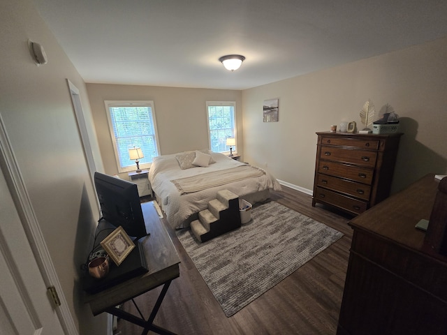 10 Thaxted Ln, Middlesboro, KY 40965 - bedroom featuring dark wood-type flooring and baseboards
