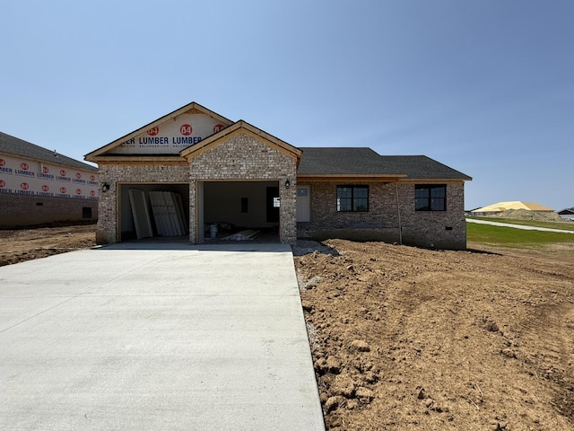 554 Middle Creek Way, Berea, KY 40403 - view of front facade with an attached garage, driveway, and brick siding