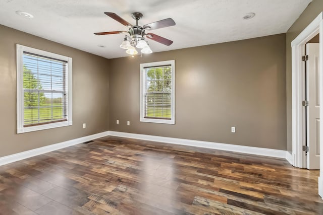 274 Singleton Waynesburg Rd, Eubank, KY 42567 - spare room with dark wood-type flooring, ceiling fan, and recessed lighting