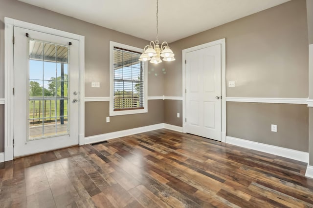 274 Singleton Waynesburg Rd, Eubank, KY 42567 - unfurnished dining area with a chandelier and wood-type flooring