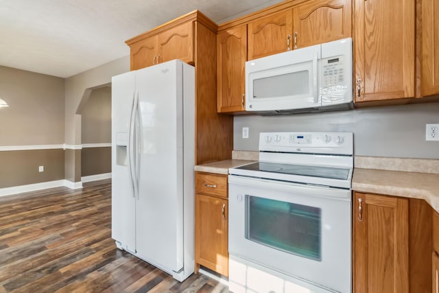 274 Singleton Waynesburg Rd, Eubank, KY 42567 - kitchen featuring white appliances, dark wood-style flooring, light countertops, and brown cabinets