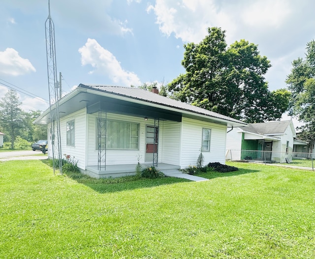 243 Walnut St, Crab Orchard, KY 40419 - view of front of property with a metal roof, covered porch, and a chimney