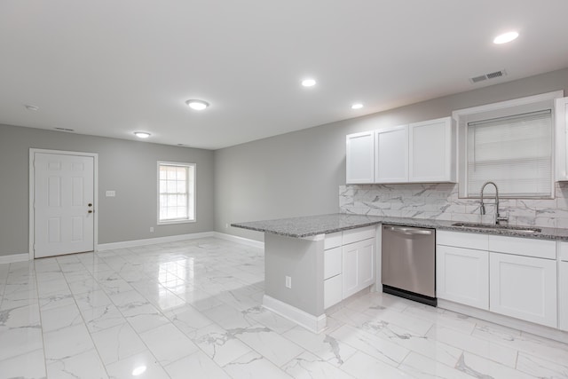 223 Race St, Lexington, KY 40508 - kitchen featuring dishwasher, white cabinetry, a peninsula, and recessed lighting
