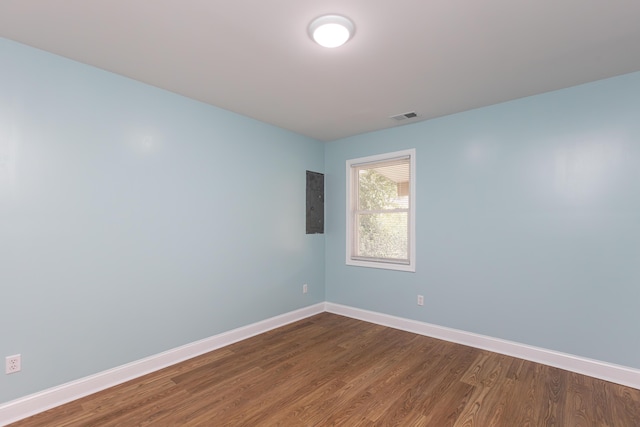 223 Race St, Lexington, KY 40508 - empty room with baseboards and dark wood-style flooring