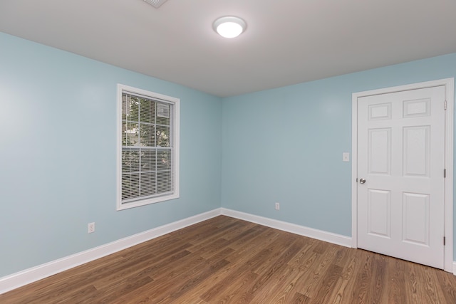 223 Race St, Lexington, KY 40508 - empty room featuring dark wood-type flooring and baseboards