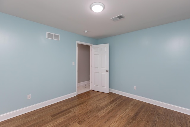223 Race St, Lexington, KY 40508 - unfurnished room with wood finished floors and a smoke detector