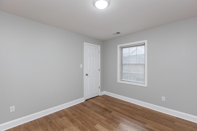 223 Race St, Lexington, KY 40508 - spare room with dark wood-style flooring