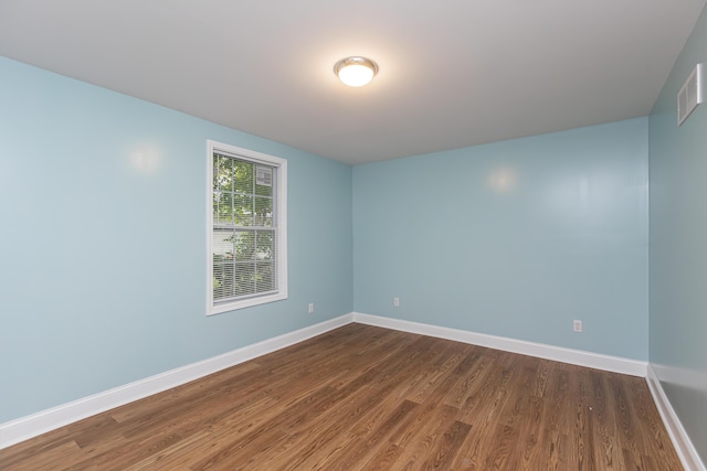 223 Race St, Lexington, KY 40508 - unfurnished room featuring dark wood finished floors and baseboards