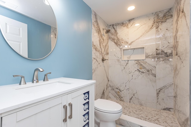 223 Race St, Lexington, KY 40508 - bathroom featuring a marble finish shower, vanity, and recessed lighting