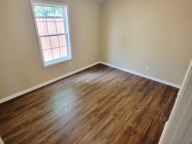 215 Wilderness Cove Ln, Georgetown, KY 40324 - empty room featuring dark wood-type flooring