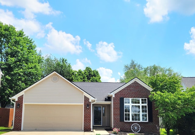 215 Wilderness Cove Ln, Georgetown, KY 40324 - ranch-style house featuring concrete driveway and brick siding