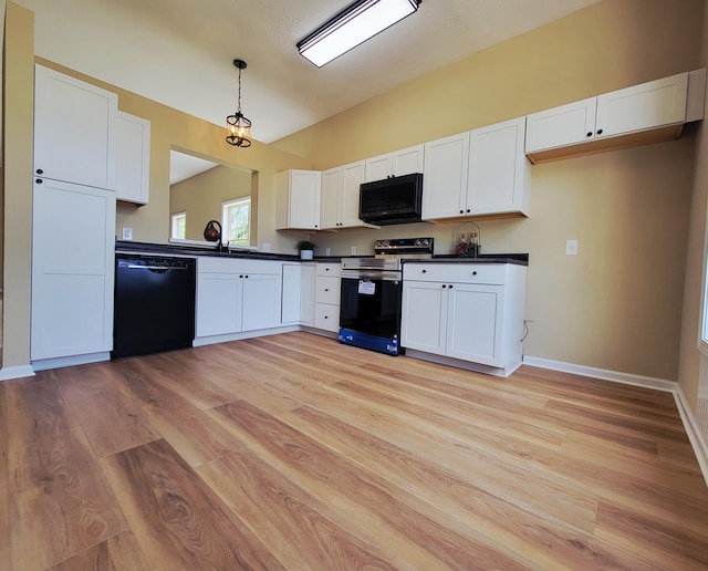 215 Wilderness Cove Ln, Georgetown, KY 40324 - kitchen with black appliances, dark countertops, light wood finished floors, and white cabinets