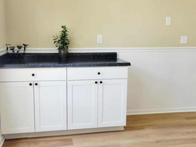 215 Wilderness Cove Ln, Georgetown, KY 40324 - detailed view of wood finished floors and a wainscoted wall