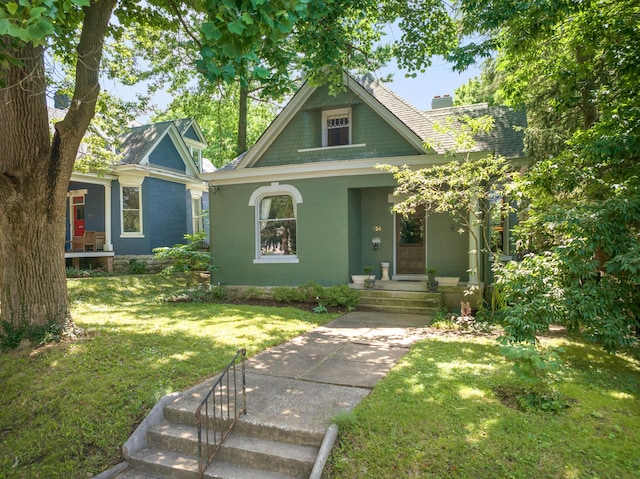 456 N Limestone St, Lexington, KY 40508 - victorian house featuring a front yard, a porch, and a chimney