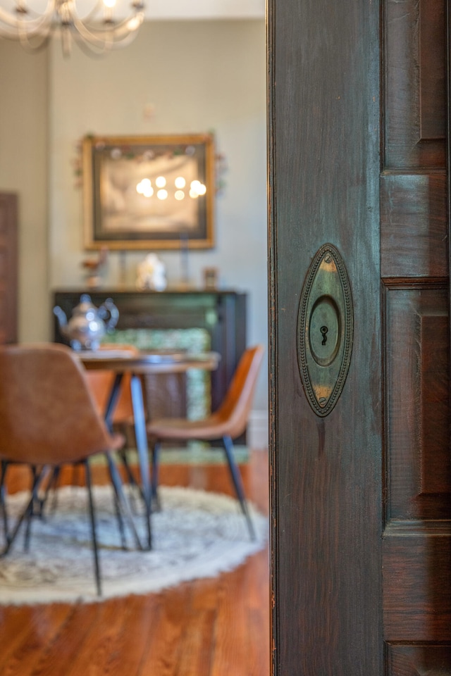 456 N Limestone St, Lexington, KY 40508 - detailed view of a chandelier and wood finished floors