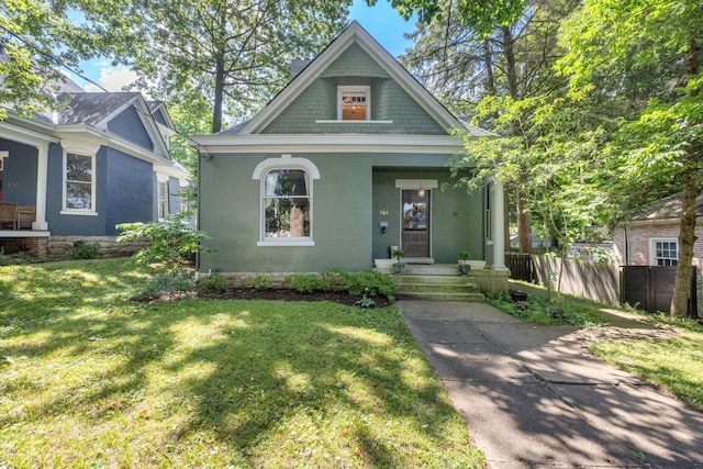 456 N Limestone St, Lexington, KY 40508 - victorian home featuring brick siding and covered porch