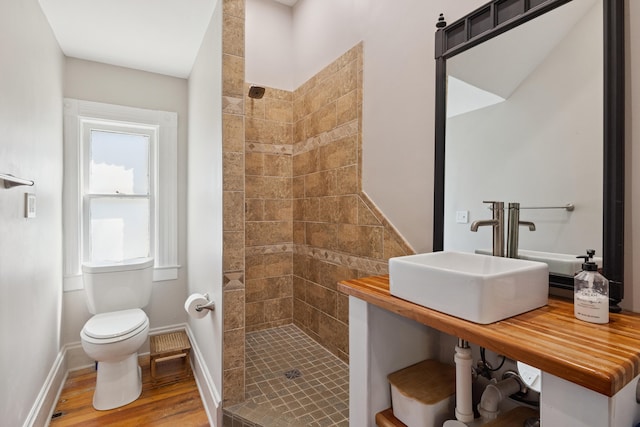 456 N Limestone St, Lexington, KY 40508 - bathroom featuring a shower stall and wood finished floors