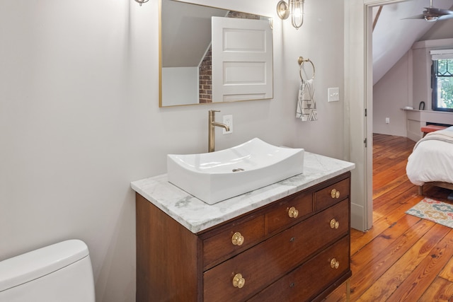 456 N Limestone St, Lexington, KY 40508 - bathroom featuring lofted ceiling, vanity, connected bathroom, hardwood / wood-style floors, and ceiling fan