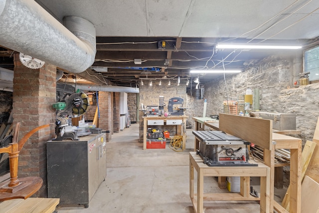 456 N Limestone St, Lexington, KY 40508 - unfinished basement featuring a workshop area