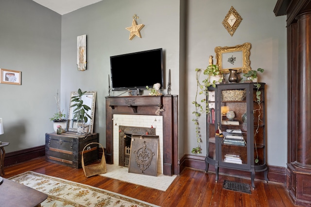 456 N Limestone St, Lexington, KY 40508 - living room featuring hardwood / wood-style flooring, a fireplace, and ornate columns
