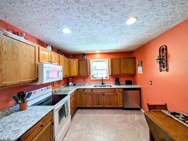 1260 Old Way Rd, London, KY 40741 - kitchen featuring white appliances, brown cabinetry, a textured ceiling, recessed lighting, and light stone counters