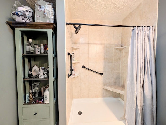 1260 Old Way Rd, London, KY 40741 - bathroom with a tile shower and a textured ceiling