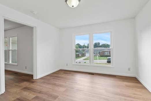 1142 Kiowa Trl, Frankfort, KY 40601 - unfurnished room with wood finished floors and a smoke detector