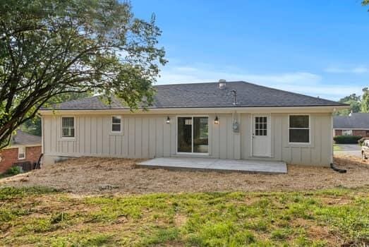 1142 Kiowa Trl, Frankfort, KY 40601 - back of property featuring board and batten siding and a patio area