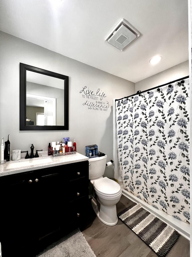525 Scenic Dr, Harrodsburg, KY 40330 - bathroom with wood finished floors, vanity, and curtained shower