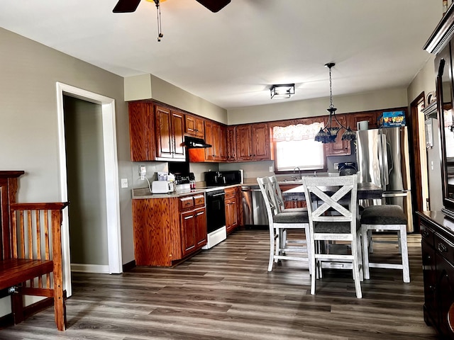 525 Scenic Dr, Harrodsburg, KY 40330 - kitchen featuring range with electric cooktop, black microwave, freestanding refrigerator, under cabinet range hood, and a ceiling fan