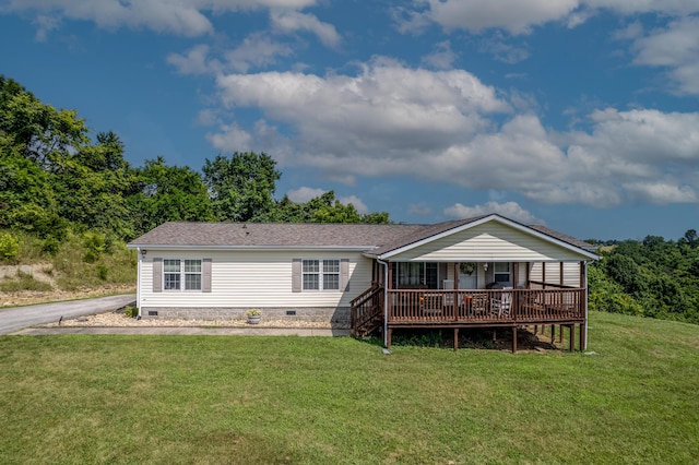 494 Janice Ln, Owingsville, KY 40360 - back of property with crawl space, a yard, and a wooden deck