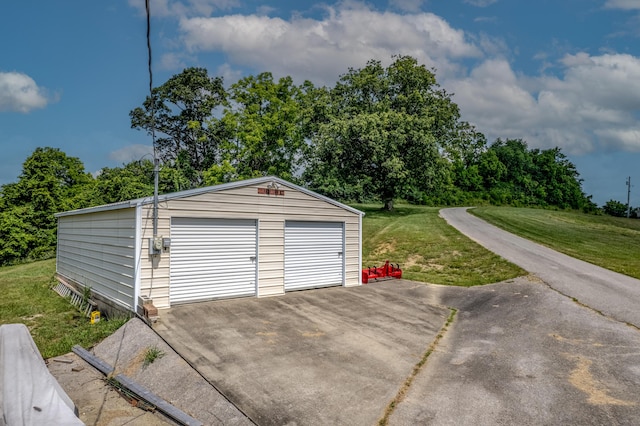 494 Janice Ln, Owingsville, KY 40360 - detached garage featuring view of wooded area
