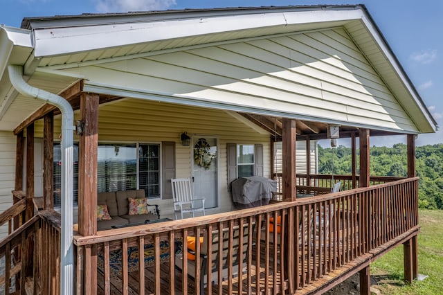 494 Janice Ln, Owingsville, KY 40360 - wooden deck featuring a grill and an outdoor living space