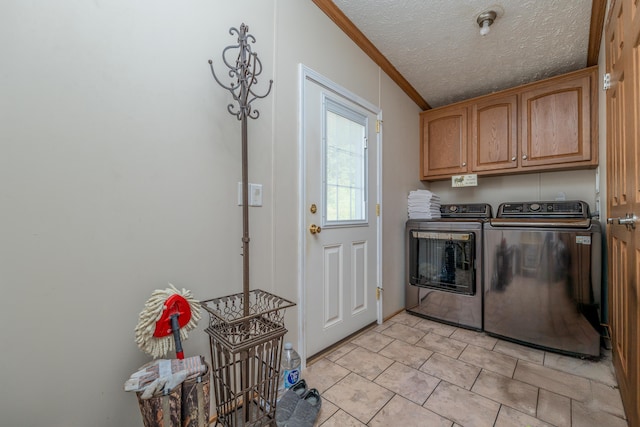 494 Janice Ln, Owingsville, KY 40360 - laundry area with washing machine and dryer, cabinet space, crown molding, light tile patterned floors, and a textured ceiling